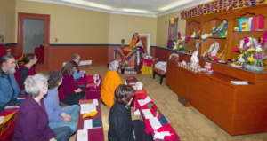 Sangha members of Chagdud Gonpa Amrita practicing in the shrine room.